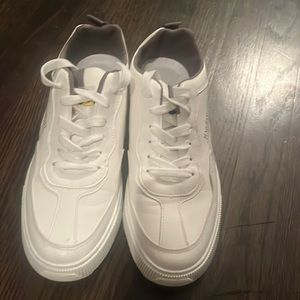 Really fashionable white sneakers. Worn one time.
